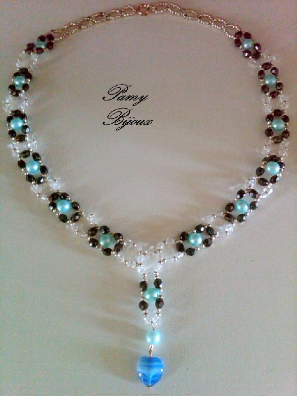 collana con perle azzurre swarovski e mezzi cristalli con cuore finale